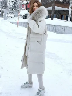 Manteau Matelassé Long Femme Comme Doudoune à Capuche avec Manches Longues à Zip avec Poches Unicolore Manteau Femme