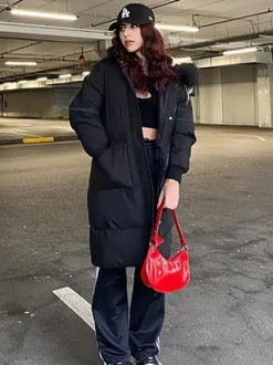 Manteau Matelassé Long Femme Comme Doudoune à Capuche avec Manches Longues à Zip avec Poches Unicolore Manteau Femme