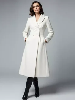 Manteau mi-long croisé en laine blanche avec revers pointus et découpe en X pour femme 2026