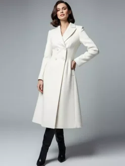 Manteau mi-long croisé en laine blanche avec revers pointus et découpe en X pour femme 2026