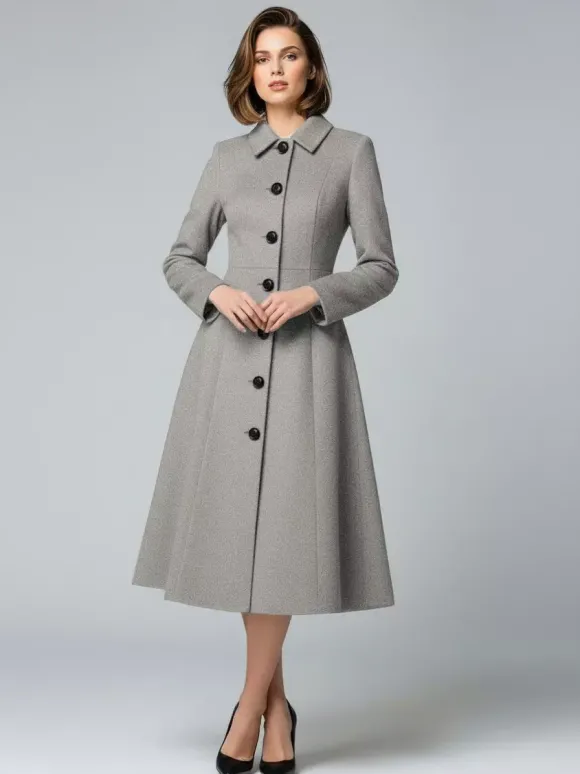 Manteau mi-long en laine coupe trapèze col chemise collection femme 2026