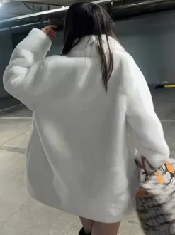 Manteau en fausse fourrure à manches longues pour femme chic surdimensionné col rabattu blanc