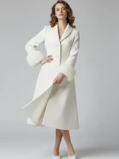 Manteau mi-long évasé en laine coupe trapèze vintage avec poignets amovibles en fausse fourrure blanche (collection 2026)