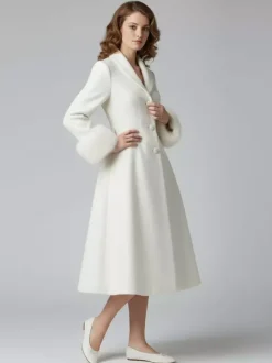Manteau mi-long évasé en laine coupe trapèze vintage avec poignets amovibles en fausse fourrure blanche (collection 2026)