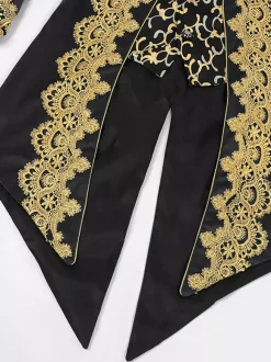 Manteau rétro vintage noir pour homme style steampunk broderies manches longues.