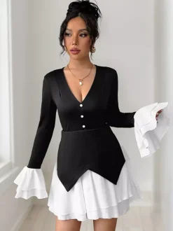 Mini-robe à manches évasées contrastées col en V et jupe superposée collection automne 2026