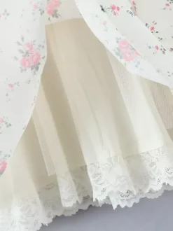 Mini-robe fleurie à épaules dénudées et n艙ud pour l'été 2026