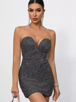 Mini-robe moulante à sequins décolleté en c艙ur et n艙ud dans le dos idéale pour les fêtes 2026