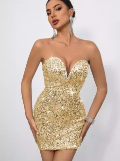 Mini-robe moulante à sequins décolleté en c艙ur et n艙ud dans le dos idéale pour les fêtes 2026