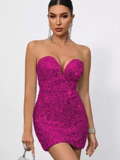 Mini-robe moulante à sequins décolleté en c艙ur et n艙ud dans le dos idéale pour les fêtes 2026
