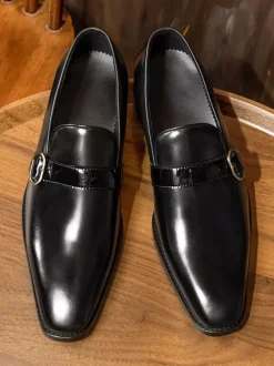 Mocassins classiques noirs à boucle en cuir de vache pour homme