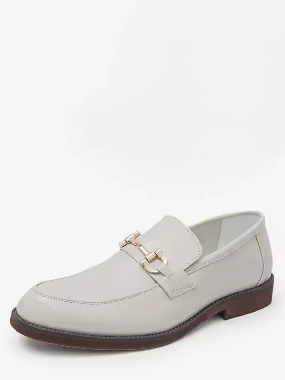 Mocassins à mors pour homme à enfiler bout pointu talons bas décoration métallique
