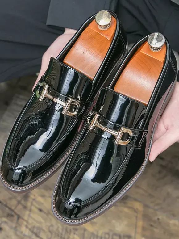 Mocassins à mors pour homme à enfiler bout pointu talons bas décoration métallique