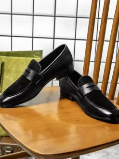 Mocassins noirs Penny en cuir de vachette à bout rond et patchwork