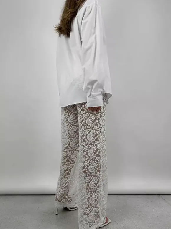 Pantalon en dentelle blanche taille naturelle coupe droite