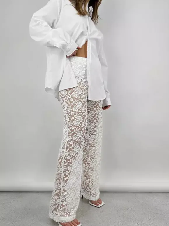 Pantalon en dentelle blanche taille naturelle coupe droite