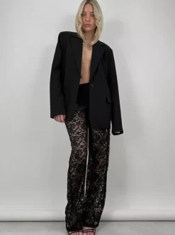 Pantalon en dentelle blanche taille naturelle coupe droite