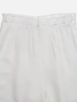 Pantalon large à taille en dentelle pour femme blanc crème taille haute élastique