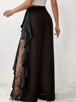 Pantalon noir uni à volants et taille naturelle idéal pour l'été
