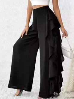 Pantalon noir uni à volants et taille naturelle idéal pour l'été