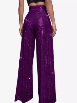 Pantalon palazzo à sequins taille haute et jambes larges style clubwear.