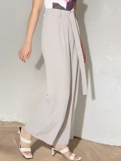 Pantalon palazzo taille haute à ceinture nouée et jambes larges plissé et décontracté