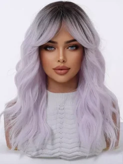 Perruque synthétique longue ondulée à racines foncées ombrées avec frange rideau couleur pastel.
