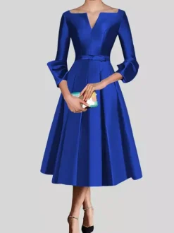 Petite robe noire jolie col en V manches 3/4 n艙uds tissu satiné ligne trapèze