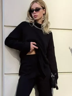 Pull col roulé oversize avec fentes latérales pour femme 2026