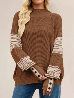 Pull en maille à col montant et rayures manches boutonnées collection femme 2026