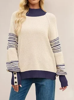 Pull en maille à col montant et rayures manches boutonnées collection femme 2026