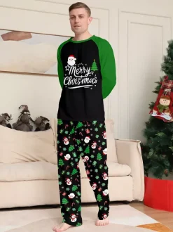 Pyjamas familiaux raglan noirs et verts à imprimé sapin et bonhomme de neige Joyeux Noël 2026