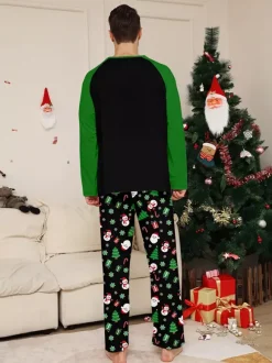 Pyjamas familiaux raglan noirs et verts à imprimé sapin et bonhomme de neige Joyeux Noël 2026