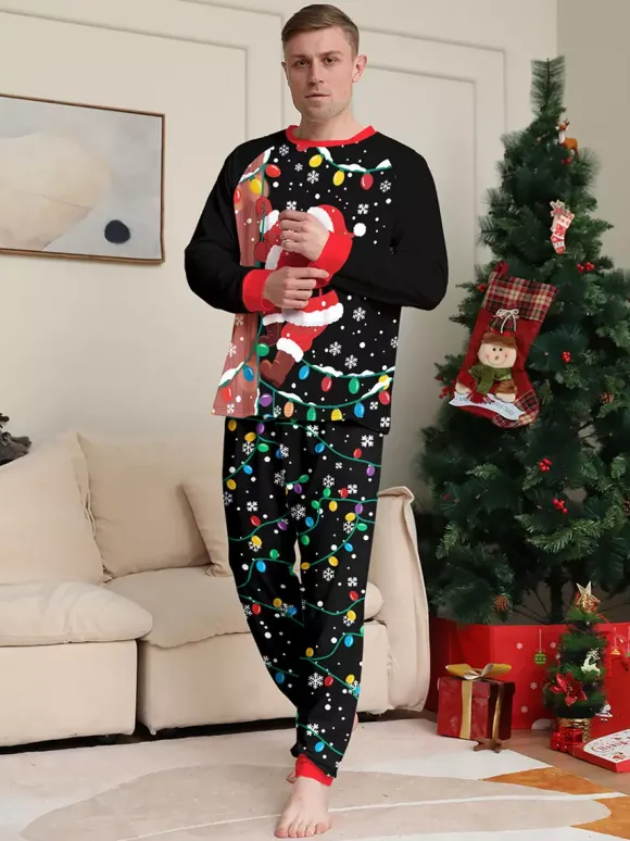 Pyjamas de Noël familiaux imprimés Père Noël noir et rouge et guirlandes lumineuses collection 2026