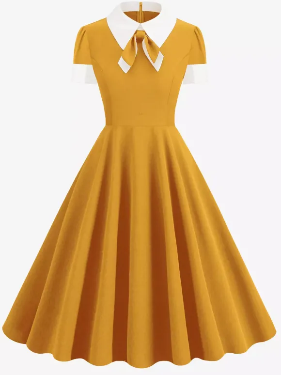 Robe cocktail vintage années 50 pour femme - Col en V manches courtes coupe trapèze buste froncé style rockabilly longueur midi - Invitée de mariage 2026