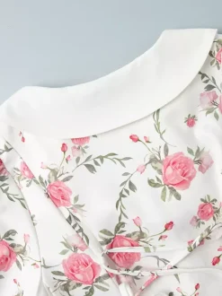 Robe courte à imprimé floral manches bouffantes col Claudine et lacets dans le dos été 2026