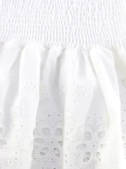 Robe courte en dentelle ajourée pour femme - Robe bustier blanche à volants et smocks - Idéale pour les vacances d'été à la plage 2026