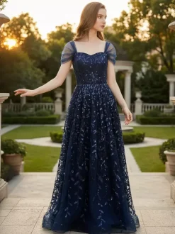 Robe de bal longue bleu profond à paillettes décolleté en c艙ur et épaules dénudées été 2026
