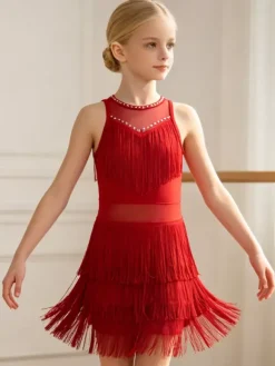 Robe de danse latine pêche pour fille en polyester avec franges élégantes. Tenue de danse latine.