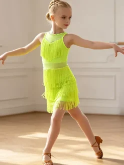 Robe de danse latine pêche pour fille en polyester avec franges élégantes. Tenue de danse latine.