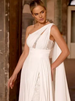Robe de mariée bohème en mousseline de soie et dentelle deux pièces avec traîne taille naturelle fermeture éclair sans manches décolleté design ivoire