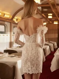 Robe de mariée courte décolleté en c艙ur manches 3/4 taille naturelle en dentelle