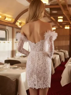 Robe de mariée courte décolleté en c艙ur manches 3/4 taille naturelle en dentelle