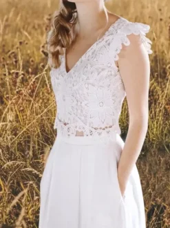 Robe de mariée deux pièces en dentelle à col en V longue jusqu'au sol sans manches fermeture éclair.