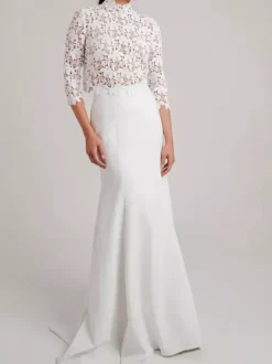 Robe de mariée deux pièces haut en dentelle col mantant manche longue jupe en jupe en satin à traîne
