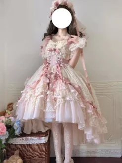 Robe de mariée Lolita rose style ballet ornée de n艙uds et de volants avec traîne.