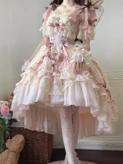 Robe de mariée Lolita rose style ballet ornée de n艙uds et de volants avec traîne.