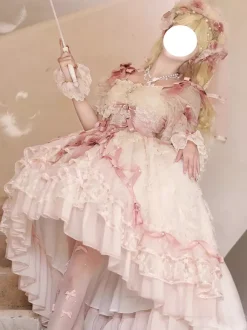 Robe de mariée Lolita rose style ballet ornée de n艙uds et de volants avec traîne.