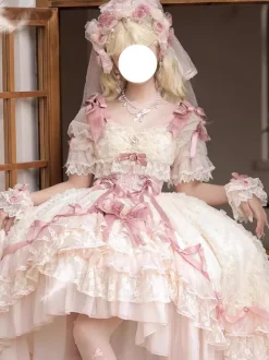 Robe de mariée Lolita rose style ballet ornée de n艙uds et de volants avec traîne.