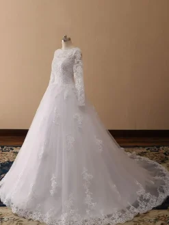Robe de mariée princess en tulle ivoire manche longue en dentelle boutonné sur dos à traîne ronde Robe de mariage